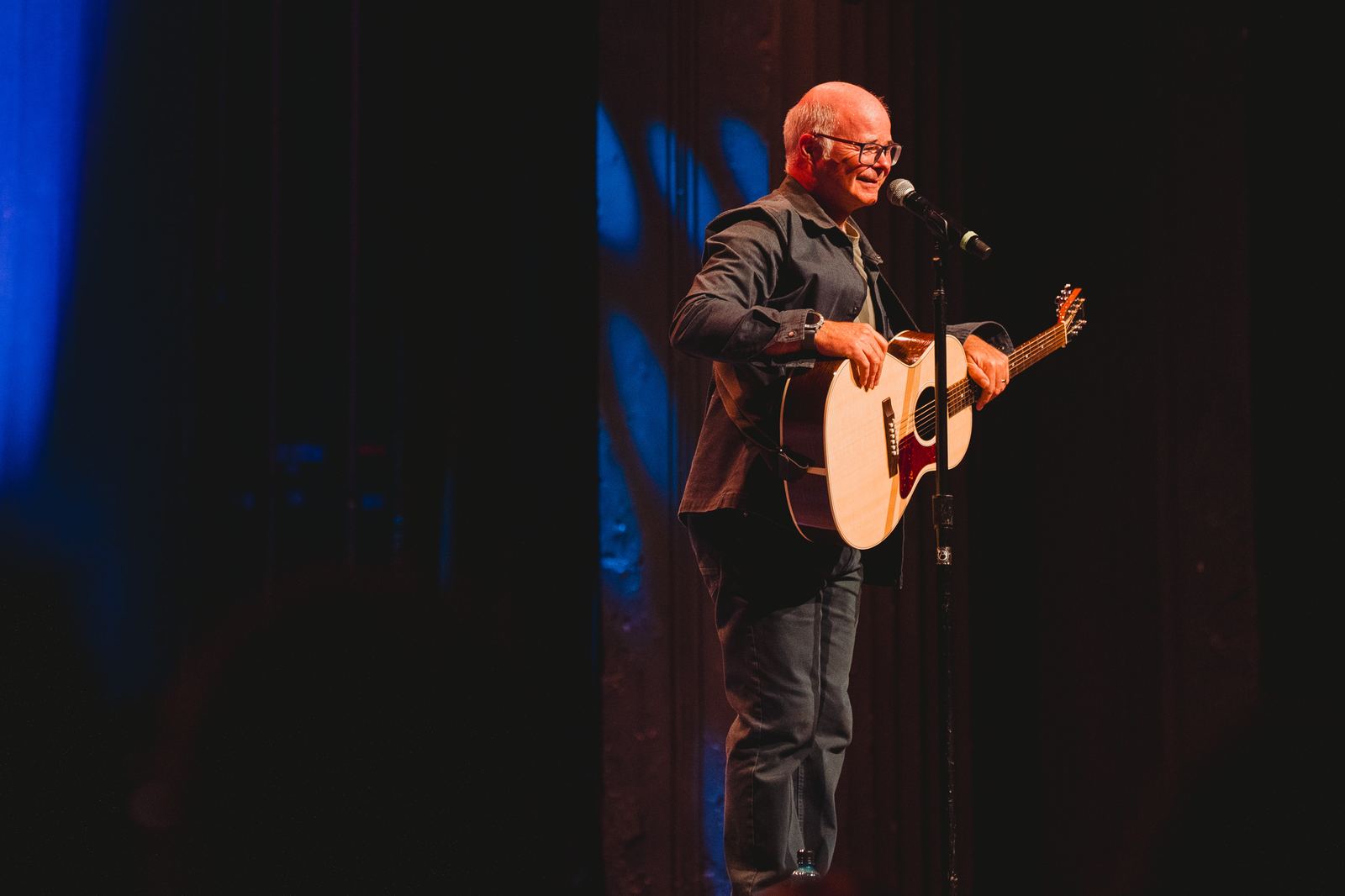 Andy Askins on stage at the Sydney Comedy Gala, Enmore Theatre